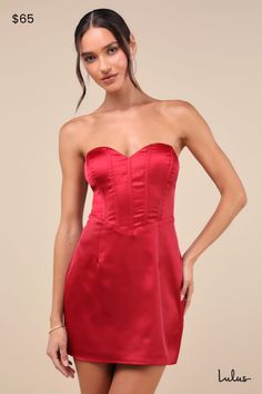 Make some room in your wardrobe for another sensational date night look like the Lulus Sexy Perfection Wine Red Satin Strapless Bustier Mini Dress! Feel like luxury the moment you slip into this sleek satin dress with an exaggerated sweetheart neckline (with hidden no-slip strips) and a strapless, bustier-inspired bodice with supportive boning throughout and lightly padded cups. The flattering, Basque-style waist tops a figure-flaunting bodycon skirt that falls to a mini hem. A trendy lace-up design accents the otherwise open back to complete the look. Hidden back zipper/clasp. Fit: This garment fits true to size. Length: Mid-thigh. Bust: Great for any cup size. Waist: Fitted - very fitted at natural waist. Hip: Loosely Fitted. Undergarments: Padded cups - May be worn with an adhesive bra, Red Bustier Dress, Red Satin Mini Dress, Angel Dresses, Bustier Mini Dress, Red Strapless Dress, Strapless Bustier, Angel Dress, Adhesive Bra, Bodycon Skirt