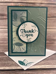 a thank you card with leaves on it