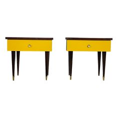 two yellow and brown nightstands side by side