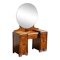 a wooden vanity with mirror and drawers