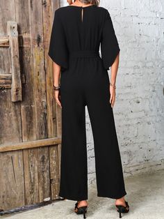 Features: Basic style Sheer: Opaque Material composition: 95% polyester, 5% spandex Care instructions: Machine wash cold. Tumble dry low. Imported Size Top Length Shoulder Bust Sleeve Length Waist Waist Stretch Amount HIP S 55.9 15.4 39 9.8 25.2 39 39.4 M 56.7 15.7 40.6 10 26.8 40.6 40.9 L 57.7 16.1 42.9 10.3 29.1 42.9 Party Dress Short, Maxi Dress Formal, Jumpsuit Shorts Rompers, Short Leggings, One Piece For Women, Formal Evening Dresses, Wide Leg Jumpsuit, Basic Style, Black Jumpsuit