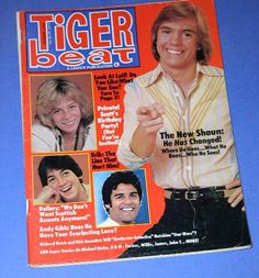 the cover of tiger beat magazine with two men smiling and one man pointing at something