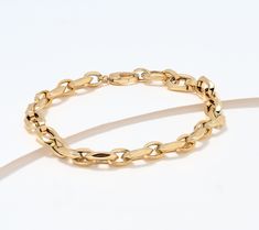 Simple sophistication, this cushion link bracelet adds gorgeous gleam to any ensemble. From David Markstein. Classic Oval Link Bracelet Jewelry, Formal Gold Link Bracelet With Bracelet Strap, Timeless Gold Link Bracelet For Formal Occasions, Timeless Formal Gold Link Bracelet, Timeless Oval Link Bracelets For Formal Occasions, Timeless Oval Link Bracelet For Formal Occasions, Classic Formal Bracelet With Chain, Elegant Link Bracelets For Formal Occasions, Formal Link Bracelet With Bracelet Strap