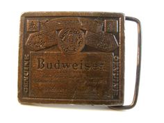 This is a great looking Belt Buckle, measuring approx. 2 1/4" X 2" and is marked as shown in photo!     Loop measures approx. 1 3/4".      Neat Buckle!        Photos constitute part of the description! Please check out my other items. Please NOTE, I do not clean any of the items as some collectors prefer to leave the original patina on the piece. Launched from my store - Powered by Highwire.com Track Page Views With Auctiva's FREE Counter Every buyer gets a MyStoreRewards invitation for cash bac Vintage Budweiser, Belt Buckle, Belt Buckles, To Leave, Patina, Product Launch, Track, Buckle, Wallet