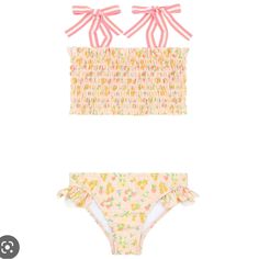 Brand New, Sold Out !! This Girls Bikini In Our Citrus Grove Print Has Thoughtful Smocked Details On The Top And A Delicate Ruffle Detail On The Bottom. Featuring Contrasting Tie Straps In Stretch Grosgrain That Are Both Sweet And Practical, This Suit Is Ready For Memories In The Sun! Cute Spring Tankini For Playwear, Playful Pink Swimwear For Playwear, Cute Fitted Tankini For Swimming, Cute Pink Tankini For Spring, Pink Playful Stretch Swimwear, Playful Pink Stretch Swimwear, Cute Stretch Swimwear, Cute Pink Spring Swimwear, Cute Pink Tankini For Poolside