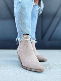 Experience complete comfort and style with the Corkys Quittin Time Booties! These booties feature a sand faux suede material that is both soft to the touch and durable. With their unique design and high-quality construction, these booties are the perfect addition to any outfit. Step into luxury with Corkys! *If you are in between sizes, we suggest sizing up beings Corkys does not come in half sizes Cozy Chic, Wedge Sneakers, Suede Material, Dressy Tops, Shoes Booties, Office Fashion, Casual Jeans, Faux Suede, Casual Tops