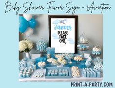 a baby shower favors sign and dessert table