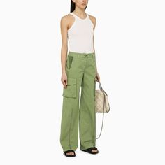 These pants are perfect for when you want style without sacrificing comfort. Made with care from organic cotton, they offer a relaxed fit that feels just right. Whether you're running errands or meeting friends, these pants have got you covered. Made from organic cotton Features a straight leg design Includes belt loops with a zip and button closure Gusseted zip openings on the legs for added flair Equipped with utility pockets, back pockets, and French pockets Corduroy accents for a touch of el Green Cargo Trousers, Pistachio Color, Stella Mc, Cotton Cargo Pants, Meeting Friends, Utility Pockets, Green Cargo, Pistachio Green, Leather Cap