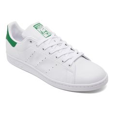 Bring Some 1970s Tennis Style To Your Everyday Look With The Adidas Men's Originals Stan Smith Primegreen Casual Sneakers. Designed For Court Superstar Stan Smith, These Clean Sneakers Have Sporty Good Looks That Go Perfectly With Today's Styles. These Sneakers Are Made With Primegreen, A Series Of High-Performance Recycled Materials Court Classic Casual Sneakers Supple Upper For Durability And Sleek Style Perforated 3-Stripes Branding At Sides Lace Closure Cushioned Insole Tonal Rubber Sole Sty Retro Green Adidas Sneakers, Classic Green Adidas Sneakers, Classic Green Lace-up Skate Shoes, Classic Green Skate Shoes For Streetwear, Classic Green Low-top Sneakers, Classic Green Sneakers With Perforated Toe Box, Stripes Branding, Tennis Style, Sleek Style