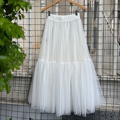 💌This skirt comes with a default length of 85 cm / 33 inches. 👗The lining of this skirt and the main body are separate, featuring both shorts and a skirt as part of the lining set. If you prefer the lining to be sewn into the skirt, please let us know. 💃This skirt comes with two layers of tulle by default, suitable for everyday wear. If you need it for a special occasion, such as a ball or wedding, you can contact us to make it with three layers for a more voluminous effect. ✨The length, colo Summer Full Skirt Petticoat For Costume Party, Spring Costume Skirt With Attached Cancan, Summer Tulle Flared Skirt, White Skirt For Spring Costume Party, Summer Tulle Skirted Bottoms, Summer Costume Party Tulle Petticoat, Summer Tulle Petticoat For Costume Party, Summer Costume Petticoat With Attached Cancan, White Skirt For Halloween Costume Party