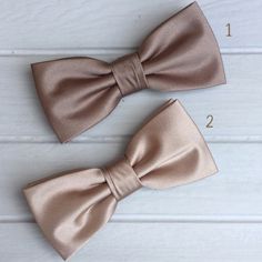 "We proudly present our premium handmade pre-tied bow tie for Adult/Men/Women/Kids/Children/Toddler/Baby boy/girl.... **The bow tie is pre tied and hand stitched into place.** Material: Satin Choose your Bow tie ATTACHMENT/STRAP: - CLIP-ON (strapless) - Adjustable VELCRO strap - Adjustable strap with METAL HOOK, EYE ADJUSTER HARDWARE SIZES are shown below: - NEWBORN-1YR : Adjustable straps fit 7\" up to 11\" neck circumference. - TODDLER (1-3YR) : Adjustable straps fit 10\"-12\" neck circumferen Dapper Adjustable Tie With Satin Bow, Pre-tied Decorative Bow For Gifts, Dapper Adjustable Bow Tie For Weddings, Adjustable Detachable Bow For Wedding, Classic Wedding Ties With Decorative Bow, Classic Wedding Tie With Decorative Bow, Dapper Bow Tie With Detachable Bow For Weddings, Pre-tied Bow With Bow Tie Back For Gifts, Adjustable Dapper Bow For Wedding