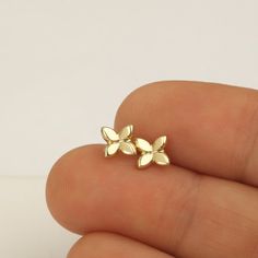 14k gold stud earrings, small gold earrings, solid gold studs, gold flower stud earrings Yellow Gold Flower Earrings In 14k, 14k Gold Flower Earrings For Gift, 14k Yellow Gold Flower Earrings For Anniversary, Gold Flower Charm Earrings In 14k Gold, 14k Gold Flower Earrings For Pierced Ears, Gold Flower Earrings With Flower Charm, Dainty Yellow Gold Flower Earrings For Anniversary, 14k Gold Earrings With Flower Charm For Gift, 14k Gold Flower Charm Earrings