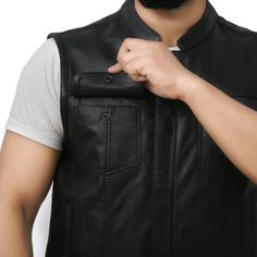 When it comes to the modern yet traditional look, the leather vest is the one to complete it for you. Best Leather NY offers you the best plunge men's motorcycle leather vest to make you fulfil your dream of looking rugged yet professional and cool. It is a cowhide leather jacket with pockets and a two-button chest. When you want to make your hiking trip worthwhile and safe, this vest is one of the best to complement your outfit. It can be worn around the city, hiked, or used as a mid-layer for Fall Leather Moto Vest, Sleeveless Leather Outerwear For Biker Events, Black Leather Motorcycle Vest, Black Leather Vest For Motorcycling, Black Leather Moto Vest, Leather Vest For Motorcycling In Fall, Leather Vest For Motorcycling, Fall Season, Winter Leather Vest For Biker Events, Leather Biker Vest For Winter