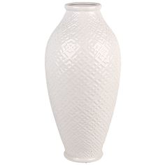 a white vase with an intricate design on the top and bottom, sitting against a white background