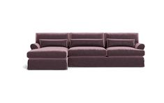 a purple couch sitting on top of a white floor