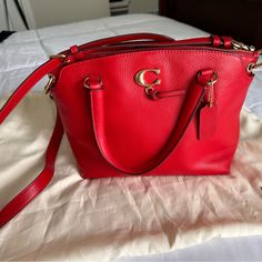 Beautiful Brand New Without Tags Coach Bag. Has A Removable Crossbody Strap, And Handles. Top Zip With Interior Slash Pockets And Zip Pocket. Two Full Size Pockets With Magnetic Closure. Perfect Condition. Chic Red Satchel With Textured Leather, Red Pebbled Leather Bag For Everyday Use, Chic Red Textured Leather Satchel, Red Top Handle Satchel With Textured Leather, Red Textured Leather Satchel With Top Handle, Red Textured Leather Top Handle Satchel, Luxury Red Pebbled Leather Bag, Red Leather Satchel With Branded Hardware, Red Leather Bag With Branded Hardware