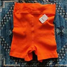 Free Throw Shorts In A Pretty Tangerine Color, Perfect For A Summer Workout Or Running Errands Brand: Free People Size: Small Condition: Nwt Feel Free To Ask Questions Or Make An Offer Orange Bottoms With Built-in Shorts For Loungewear, Spring High-waisted Stretch Athletic Shorts, Spring Stretch High-waisted Athletic Shorts, Spring Workout Shorts With Elastic Fit, Orange Loungewear Bottoms With Built-in Shorts, Elastic Biker Shorts For Summer, Spring Elastic Biker Shorts, Elastic Biker Shorts For Spring, Spring Stretch Shorts