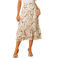 Featuring pretty ditsy floral prints, this midi skirt is a summer option that can be worn with just about anything. Channel elegant style in this midi skirt which is beautifully printed with a blossom pattern for a versatile look. It is made of lightweight fabric, adding definition to the free-flowing design. Falling to a waterfall midi hem, it sits high on the waist with a discreet side zip fastening. Summer days call for effortlessly feminine styles like skirts. Spring Floral Print Skirted Bottoms, Feminine Skirt For Spring, Non-stretch Summer Midi Skirt, Feminine Summer Midi Skirt, Summer Feminine Midi Skirt, Feminine Midi Skirt For Summer, Feminine Midi-length Summer Skirt, Floral Print Flared Skirt Bottoms For Summer, Chic Ditsy Floral Print Skirt For Spring