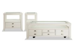 two white tables with drawers on each side