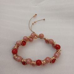 Glass Bead Bracelet Peach/Red/Gold Glass Beads Gold Metal Accents Bamboo Cord Adjustable One Size Fits Most Handmade With Love Adjustable Rose Gold Beaded Bracelets, Rose Gold Beaded Bracelet With Round Beads, Rose Gold Bracelets With Colorful Round Beads, Rose Gold Bracelet With Colorful Round Beads, Elegant Rondelle Beaded Bracelets With Colorful Beads, Elegant Rondelle Beaded Bracelets, Adjustable Rose Gold Bracelets With Colorful Beads, Adjustable Rose Gold Bracelet With Colorful Beads, Adjustable Crystal Bracelet With Large Beads