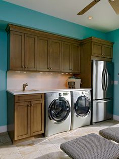 an image of a laundry room with fridge and washer in the same color scheme