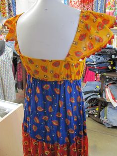 "1970's colorful strapless boho maxi dress. Mannequin Measurements: 34.5\" Bust 24\" Waist 31.5\" Hips Approximate Measurements: taken flat 15.5\" armpit to armpit up to 21\" waist up to 26\" hips 54\" length Great vintage condition. No visible flaws." Retro Multicolor Maxi Dress With Vibrant Print, Retro Summer Maxi Dress With Vibrant Print, Bohemian Sundress With Colorful Pattern, Retro Multicolor Maxi Dress For Summer, Retro Summer Maxi Dress, Vintage Summer Maxi Dress With Retro Print, Multicolor Vintage Maxi Dress For Vacation, Vintage Multicolor Maxi Dress For Vacation, Colorful Fitted Bohemian Maxi Dress