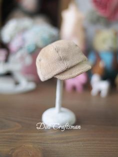 a small hat is sitting on top of a table