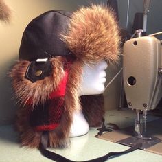 Trapper hat, made of recycled fur and real leather. Also made of upcycled buffalo plaid vest. Comfy lining. How to take the mesurement of your head:  Place the tape above the ears and mesure around your head in keeping as straight as possible.          SIZE CHART XS---20--21.5 inches S---21.5---22.5 inches M---22.5---23.5 inches  L---23.5---24.5 inches XL---24.5---25.5 inches Buffalo Plaid Vest, Straight As, Trapper Hat, Trapper Hats, Plaid Vest, How To Take, Buffalo Plaid, Real Leather, Caps Hats