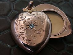 "WE SELL THIS NICE vintage antique locket photo pendant heart shape made in pinkish 9k gold decorated with genuine rose cut diamond, IN VERY GOOD CONDITION ,HAS SOME SIGNS OF WEAR COMMENSURATE WITH AGE AND USE , PLEASE SEE PICTURES, BEAUTIFUL ANTIQUE PIECE, the measures are 1 1/8\" X 7/8\" / weight 6.6gr As is a vintage antique item , it's unique , for that if you like to wear it , don't miss the opportunity, we gladly offer MICRO-PAYMENTS upon request, email me with your payment plan. OUR POLIC Medallion Jewelry With Rose Cut Diamonds As Gift, Victorian Engraved Rose Gold Locket Necklace, Rose Gold Hallmarked Locket Necklace Gift, Victorian Rose Gold Locket Jewelry, Antique Rose Gold Locket Necklace, Victorian Rose Gold Locket Necklace, Rose Gold Pendant Locket Necklace With Vintage Charm, Victorian Rose Gold Locket Necklace For Wedding, Gold Heart-shaped Rose Cut Diamond Jewelry