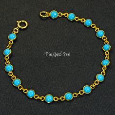 Thank you for coming in! Spectacularly beautiful solid gold bracelet with sleeping beauty turquoise round coin bezels and large Italian spring ring clasp! The color is 100% natural, so vibrant and rich blue that you only find in old material! 7 inch bracelet! A piece of unique jewelry that full of personality! Made with 18k solid gold! Stamped "750"! WEIGHT: 13.5 carats DIMENSION of Turquoise bezels: Approx 3.8mm MATERIAL: 18K Solid Yellow Gold, Turquoise Sleeping Beauty Turquoise Jewelry, Solid Gold Bracelet, Gold Armband, Sleeping Beauty Turquoise, Yellow Gold Bracelet, Solid Yellow, Turquoise Jewelry, Last Minute Gifts, Spring Rings