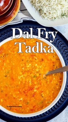 a bowl of dalfry tadka with rice on the side