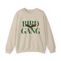 Go Birds This heavy blend crewneck sweatshirt is a must for this season. Wear this sweatshirt to the next game, whether you're catching the game at the Linc, Xfinity Live, or at home, show your love for the underdogs of the game. Our comfortable sweatshirt featuring the loved chant is sure to start the crowd screaming. This sweatshirt makes a great gift for you, your family, a friend, your boss, a co-worker, and everyone!!  Ideal for any situation, a unisex heavy blend crewneck sweatshirt is pure comfort. These garments are made from polyester and cotton. This combination helps designs come out looking fresh and beautiful. The collar is ribbed knit, so it retains its shape even after washing. There are no itchy side seams on these sweaters.  🌟 Extremely soft, light-weight, & comfortable ? Streetwear Screen Print Crew Neck Sweats, Band Merch Hoodie With Relaxed Fit And Crew Neck, Band Merch Sweater With Letter Print And Relaxed Fit, Streetwear Crew Neck Sweatshirt, Cotton Crew Neck Sweatshirt With Screen Print, Winter Crew Neck Sweater With Slogan, Cotton Long Sleeve Band Merch Sweatshirt, Cotton Long Sleeve Sweatshirt With Band Merch, Winter Crew Sweatshirt With Screen Print