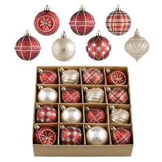 twelve red and white christmas ornaments in a box