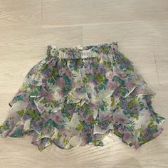 Size Xs, Stretchy Waistband, Never Worn Purple Skirt With Elastic Waistband For Summer, Purple Mini Skirt For Spring, Purple Skirted Bottoms For Spring, Purple Floral Print Mini Skirt, Summer Floral Print Purple Mini Skirt, Summer Purple Floral Print Mini Skirt, Purple Flowy Mini Skirt For Summer, Flowy Purple Mini Skirt For Summer, Purple Party Skort For Spring