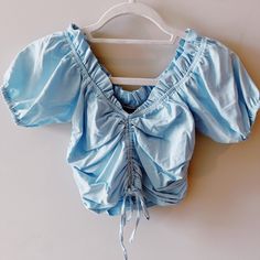 Never Been Worn Before! Super Cute It’s From A Boutique In Tuscaloosa! Size Small. Willing To Negotiate Lmk! Blue Ruched Short Sleeve Top, Short Sleeve Ruched Tops For Vacation, Ruched Short Sleeve Tops For Vacation, Light Blue Puff Sleeve Summer Top, Light Blue Puff Sleeve Top For Summer, Blue Spring Crop Top For Brunch, Blue Ruched Tops For Spring, Light Blue Short Sleeve Crop Top For Day Out, Summer Blue Ruched Blouse