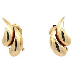 A pair of 14k yellow gold ear clips by Tiffany & Co. Origin: Germany. Age: circa 1980. Measurements: circa 2.7 cm long. Weight: circa 10.6 grams together. Hallmarks: Signed: Tiffany & Co. Stamped with "Germany" and "14kt". These ear clips can be changed into earrings suitable for pierced ears by a goldsmith. Please contact us for more information. Pease note that these ear clips will be shipped from The Netherlands and that any VAT/Customs charges are payable by the buyer. The parcel will be ins Ear Clips, Tiffany And Co, Pierced Ears, Tiffany & Co., The Netherlands, Ear Piercings, Clip On Earrings, Jewelry Earrings, Yellow Gold