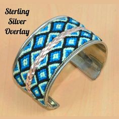 I'm Currently Running An Additional Sale. See Listing At The Top Of My Closet For Details. Store Closing! See 1st Listing For Details. Price Firm Unless Bundled! Reduced From $25! This Bracelet Is Brand New. It's Sterling Silver Plated With Blue, Silver, Black, Green & Off White Threading In An Aztec Print. It's Adjustable. This Is Handmade, So It's Not Perfect. Please Ask If You Have Any Questions. Look At The Pics Carefully. They're Part Of The Description. Store Closing, Aztec Print, Not Perfect, Threading, Adjustable Bracelet, Womens Jewelry Bracelets, Black Green, Cuff Bracelet, Turquoise Bracelet