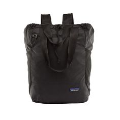 Patagonia Black Ultralight Black Hole Tote pack is made of recycled nylon. It is weather-resistant and packable. Features a main compartment and large interior and exterior zippered pockets and double stretch mesh water bottle pockets. It has adjustable, breathable shoulder straps and can be carried as a tote or a backpack and stuffs into its own pocket. Made of 100% recycled nylon with a 100% recycled polyester lining. Dimensions: 15.5" x 10.25" x 8" 27L (1,648 cu in) BRAND FACTSPatagonia grew Sac A Dos Patagonia, Patagonia Brand, Gear Organizer, Backpacking Packing, Jairzinho, Nylon Tote, Water Repellent Fabric, Waist Pack, Travel Tote