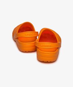 The Classic Clog model  from the brand   Crocs  which is part of the SP2022  season, has arrived || is now available at . Casual Orange Clogs With Rubber Sole, Casual Orange Slip-on Mules, Casual Orange Closed Toe Mules, Orange Casual Synthetic Clogs, Orange Synthetic Casual Clogs, Casual Orange Synthetic Clogs, Orange Crocs, Crocs Classic Clogs, Clogs