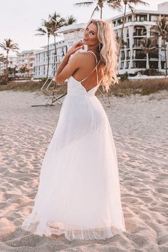 Turn heads in our gorgeous white 'True Romance' maxi dress featuring lightweight layered material with a beautifully pleated under layer and a dainty tulle top layer, a deep v-cut neckline, adjustable spaghetti straps that cross a deep open back, a fitted waistline, and a flowy skirt silhouette that cascades into an uneven floor-length hemline! Measurements S : Bust 28", Hip 36", Length 56", Waist 27". M : Bust 30", Hip 38", Length 57", Waist 29". L : Bust 32", Hip 40", Length 58", Waist 31". Pleated Tulle, Tulle Maxi Dress, Tulle Top, True Romance, Impressions Online Boutique, Uneven Floor, Flowy Skirt, Model Fits, V Cut