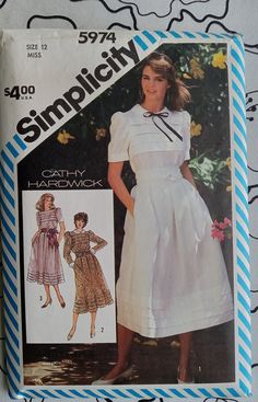 an old fashion sewing pattern for a woman's dress and jacket, with the words simplicity printed on it