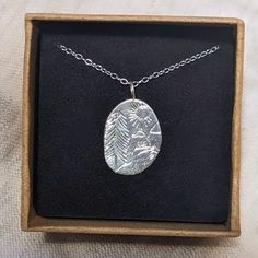 Sterling Silver Hand Engraved Peak District Necklace The sterling silver pendant is around 1.5cm tall and 1cm wide. It has been carefully engraved by hand to represent a scene inspired by the beautiful Peak District, in the UK 🏞️ The pendant is accompanied by an 18" chain. Please do message me if you would like a different length chain, I will happily accommodate where possible. Every purchase comes boxed and gift wrapped at no extra charge. - All metal used is 100% recycled - Handmade in Sheff Artistic Engraved Sterling Silver Necklaces, Artistic Engraved Sterling Silver Necklace, Etched Sterling Silver Pendant Necklace, Artistic Engraved Silver Necklaces, Silver Etched Nature-inspired Necklaces, Nature-inspired Silver Etched Necklaces, Silver Engraved Nature-inspired Necklace, Artistic Silver Jewelry, Stamped, Artistic Silver Jewelry Stamped