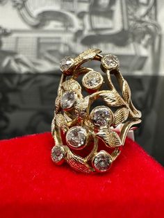 14k Yellow Gold Art Nouveau Diamond Ring Material: 14k Yellow Gold Gemstone: Diamond (Old European Cut) Total diamond carat weight: 1.12 carats (approximately - stones in mounting) Ring size: 6.75-7 (US sizing) (fits more as a size 7 due to its shape) Total weight: 6.6 grams Time period of origin: 1900's We have a GIA gemologist on our team. All jewelry items are authenticated. Victorian Diamond White Ring With 17 Jewels, Victorian 14k Gold Cluster Ring For Anniversary, Victorian 14k Gold Ring With Rose Cut Diamonds, Victorian 14k Gold Diamond Ring With Rose Cut Diamonds, Antique Oval Hallmarked Diamond Ring, Art Deco Diamond Ring Stamped 14k, Art Deco Diamond Cluster Ring With 17 Jewels, Victorian Diamond Ring With 17 Jewels, Antique Cluster Ring With Diamond Accents