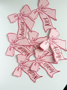 pink bows with happy birthday written on them are arranged in the shape of a bouquet