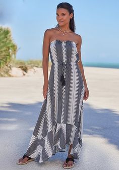 From sun-soaked days to starlit nights, our striped strapless maxi dress is your versatile wardrobe essential. Summer Strapless Midi Dress For Vacation, Strapless Maxi Dress For Spring Vacation, Bandeau Sundress Maxi For Beach, Casual Strapless Maxi Dress For Beach Season, Summer Strapless Midi Dress For Beach, Summer Midi Strapless Dress For Beach, Bandeau Maxi Dress For Beach, Summer Maxi Strapless Dress For Day Out, Bohemian Strapless Maxi Dress For Day Out