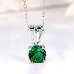 Features The lab created emerald necklace in sterling silver has a classic and luxurious design that is perfect for any occasion. Made all by hand! It truly deserves a spot in every jewelry collection. Beautifully crafted, this style is sure to become a treasured keepsake. It is made of 925 sterling silver. Made to last a lifetime, strong and durable! Strict health standards guarantee your everyday wearing. Lead-free, cadmium-free, nickel-free and allergy-free. Harmless to your health. Mirror po Silver Necklace Pendant, Lab Created Emerald, Emerald Necklace, Pretty Box, Stone Setting, Luxurious Design, Sterling Silver Necklace Pendants, Timeless Jewelry, Allergy Free