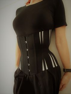 This is a one or two (with busk) panelled under-bust corset pattern with a gentle cinch to accentuate your waist (3'' waist reduction on standard sizes). The main panel is curved into the ribs and hips by the addition of gores. The gores allow for great flexibility with sizing. There are many gores - you will become good at 'gores' if you attempt this design! ALSO INCLUDES A 25 PAGE DOCUMENT OF CORSET CONSTRUCTION NOTES! Intermediate standard (not recommended for complete beginners). Note - a 2'' lacing gap is factored into this pattern.  The corset length measures 29cm (11 1/2'') at the front and 35cm (14'') at the back.  This pattern is drafted in AutoCAD and downloadable as a pdf file - you will need to print out on size A (letter) or A4 paper, making sure 'actual size' is ticked in you Stretch White Corset With Boned Bodice, White Stretch Corset With Boned Bodice, White Stretch Underbust Corset, White Fitted Costume Corset, Fitted White Corset For Costume, Fitted Overbust Bodice For Costume, Fitted Overbust Corset Dress For Cosplay, Fitted Corset Dress With Boning For Costume Party, Fitted Boned Bodice For Cosplay