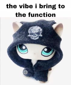 a doll wearing a hat and scarf with the caption that reads, i am not sure what this is