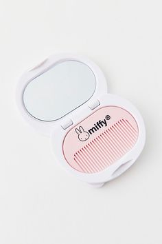 Touch up your makeup and tame flyaways while you’re on-the-go with this compact mirror featuring a Miffy silhouette with a comb resting in the case. Features Miffy Compact Mirror & Comb Set Miffy-shaped compact with an integrated mirror Petite comb for touching up your hair Perfect for gifting Content + Care Includes compact mirror & comb Plastic, glass Wipe clean Imported | Miffy Compact Mirror & Comb Set in White at Urban Outfitters Cool Stuff To Buy On Amazon, Gifts To Get Your Best Friend, Miffy Makeup, Miffy Decor, Compact Mirror Aesthetic, Cute Stuff To Buy, Christmas Gift Wishlist, Pink Girly Things Accessories, Stuff To Buy On Amazon