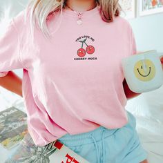 🩴 Cherries Shirt.  You Love Me Berry Much! 🩴 Click here to view our shop for more great designs --- https://www.etsy.com/shop/GraceAndFlipFlops Click on the ❤️ to see our new designs as they arrive. 🩴 Comfort Colors T-Shirt - The unisex cotton tee is the perfect staple of any wardrobe. The Unisex relaxed fit makes it an excellent daily choice. 🩴 Sizing - See listing image for a specific sizing chart for this style. Please note these are unisex style, and therefore have a more relaxed fit. If Cute Pink T-shirt With Text Print, Cute Pink Slogan Tops, Kawaii Cotton T-shirt With Letter Print, Kawaii Crew Neck Top With Letter Print, Kawaii Crew Neck Shirt With Letter Print, Kawaii Relaxed Fit Top With Graphic Print, Kawaii Graphic Print Tops With Relaxed Fit, Kawaii Crew Neck Top With Screen Print, Kawaii Graphic Print Top With Relaxed Fit